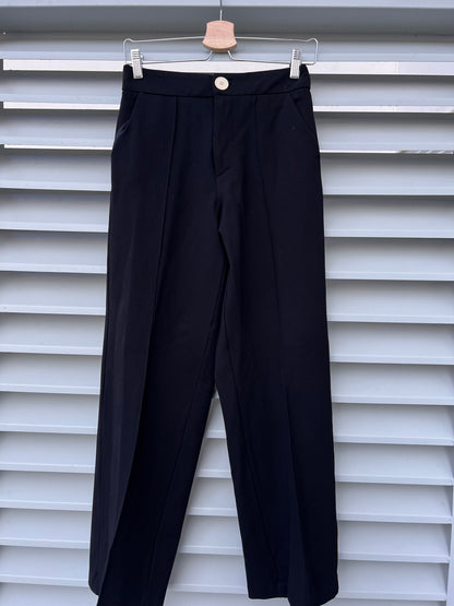 COMMELLE. Pantalón negro de vestir