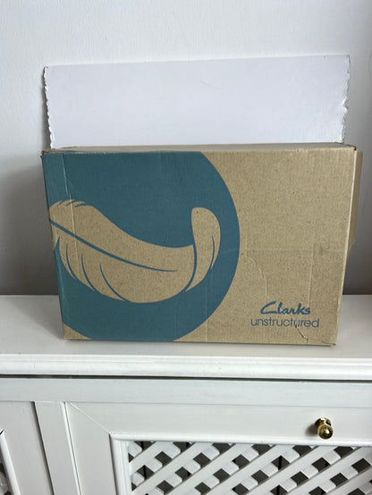 CLARKS. Zapatos textura animal print. T 40