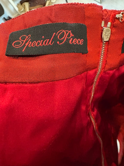 DOLCE & GABBANA. Falda midi roja vuelo