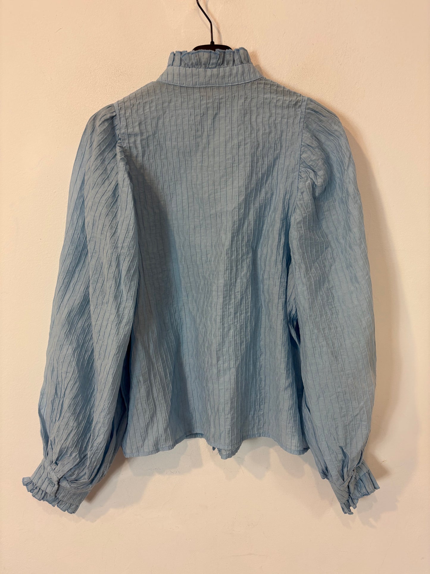 Blusa azul claro textura