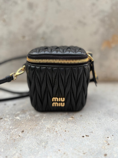 MIU MIU. Matelassé nappa leather micro bag