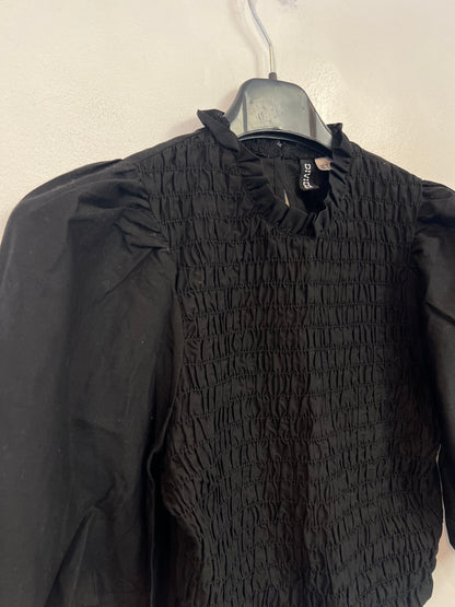 H&M. Top negro nido abeja