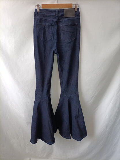 UTERQÜE. Pantalón denim volantes T.38