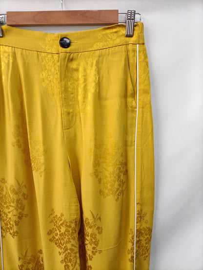 BERSHKA. Pantalón culotte flores T.M