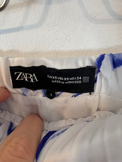 ZARA. falda midi plisada flores T.xs