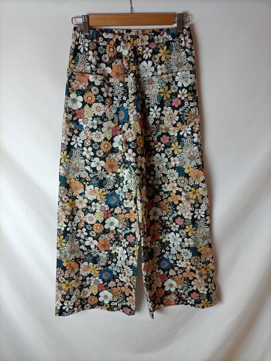 ERIC&CHIC .Pantalones negros flores T.XS