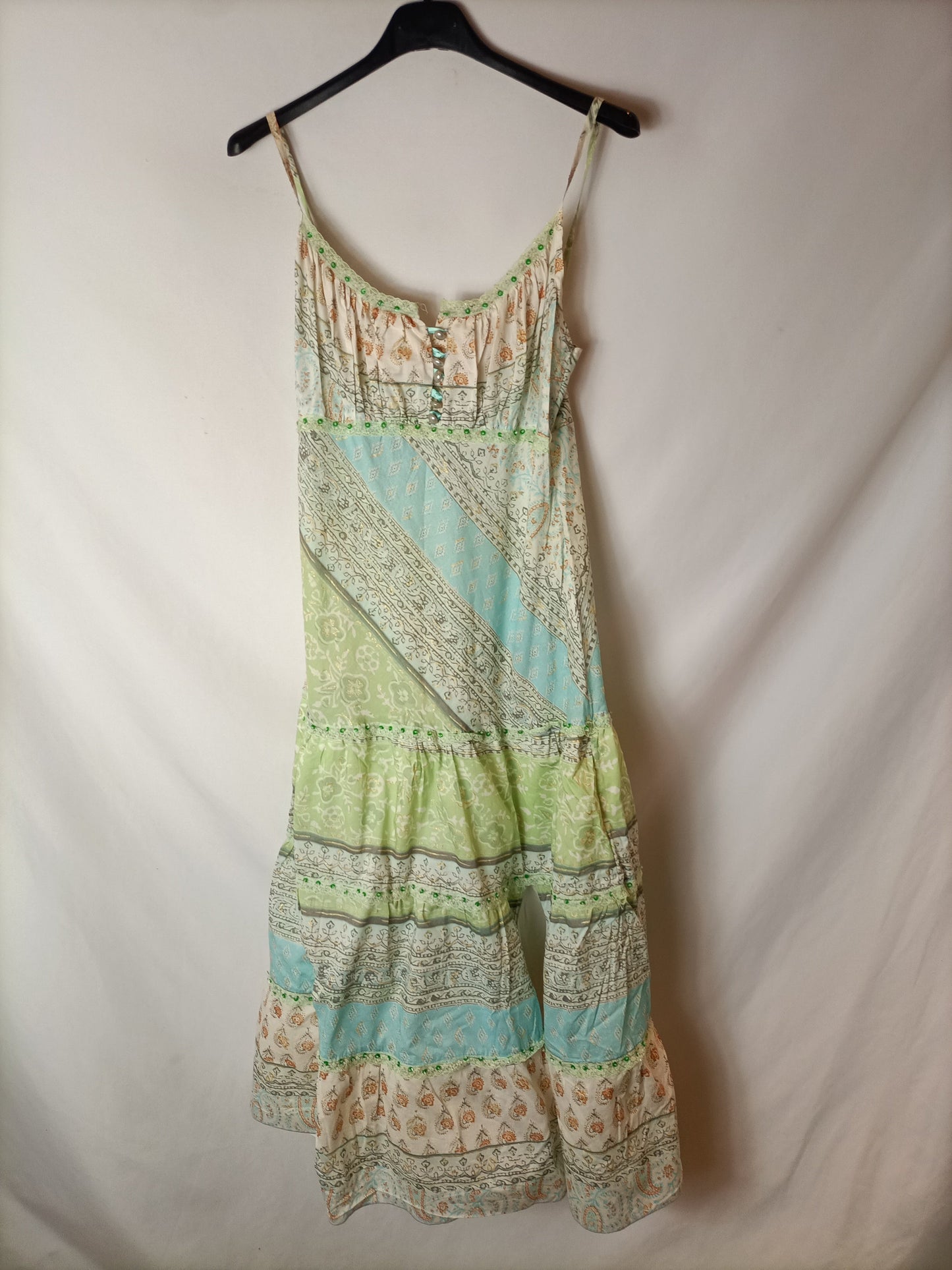 LIBERTY FASHION. Floral print dress with sequin mini skirt. TM