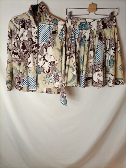 ALMA AGUILAR. Total jacket and skirt look. Size 38