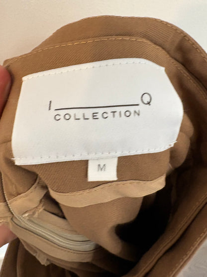 IQ COLLECTION. Falda midi marrón bolsillos