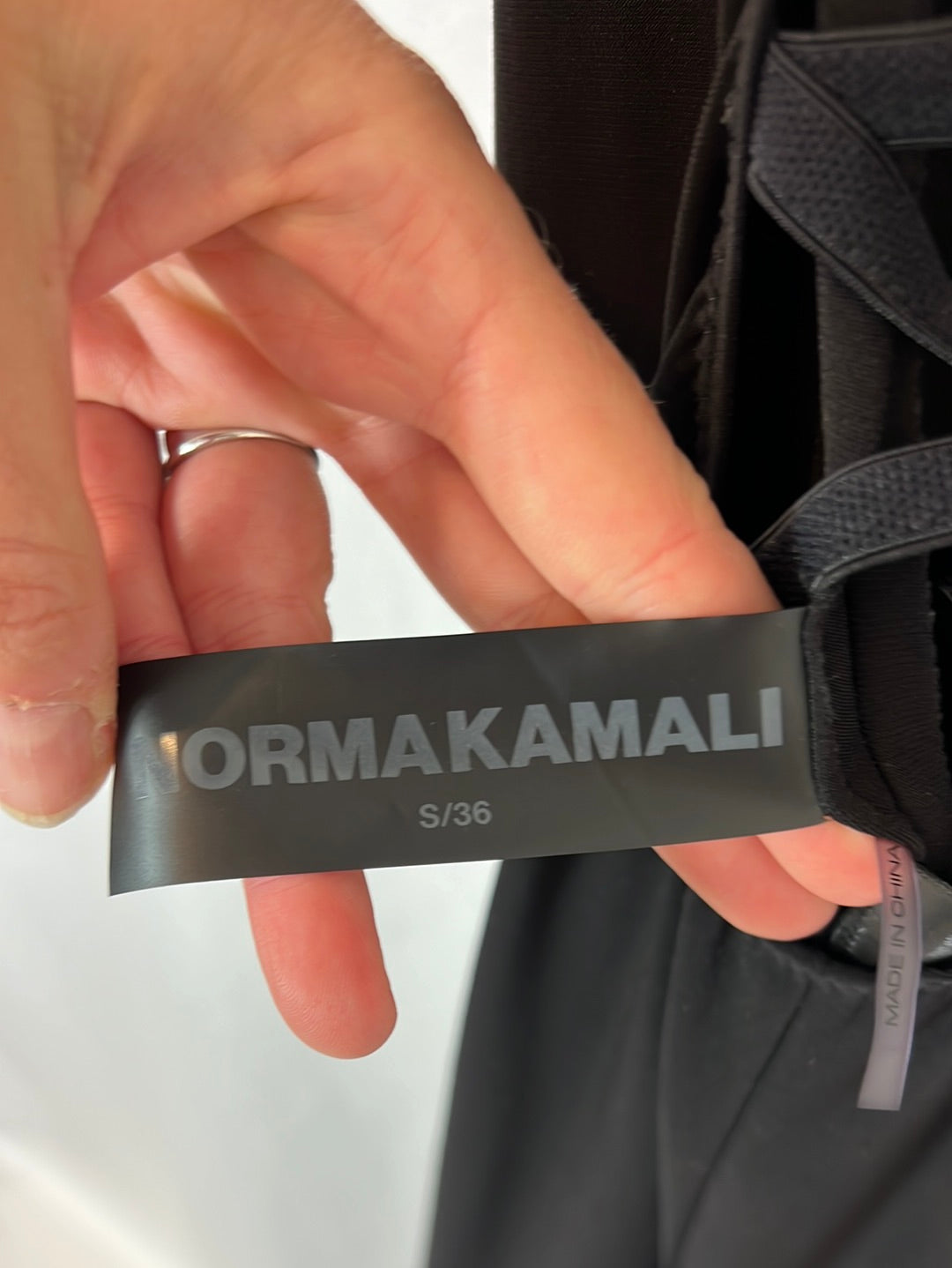 NORMAKAMALI. Black open back Ts jumpsuit