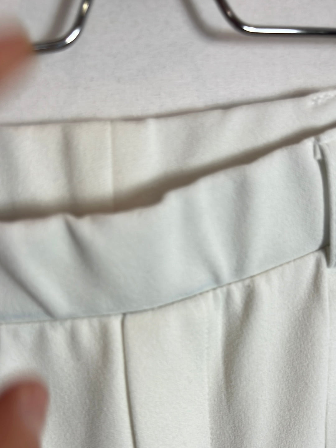 BERSHKA. White stretch flared trousers. XS