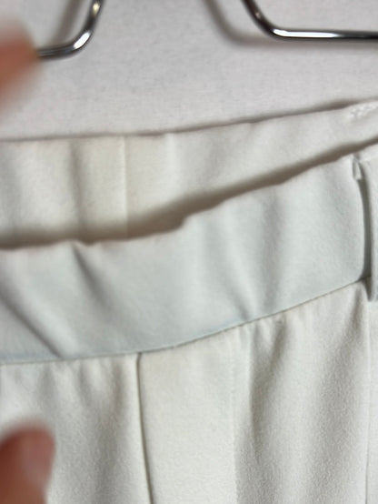 BERSHKA. White stretch flared trousers. XS