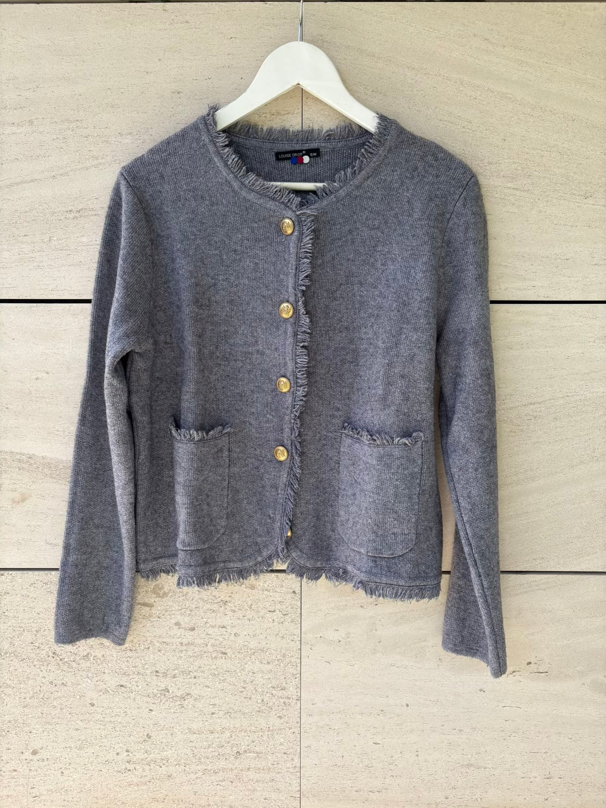 Chaqueta gris botones dorados con lana