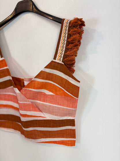 VANDERWILDE. Conjunto top y falda flecos