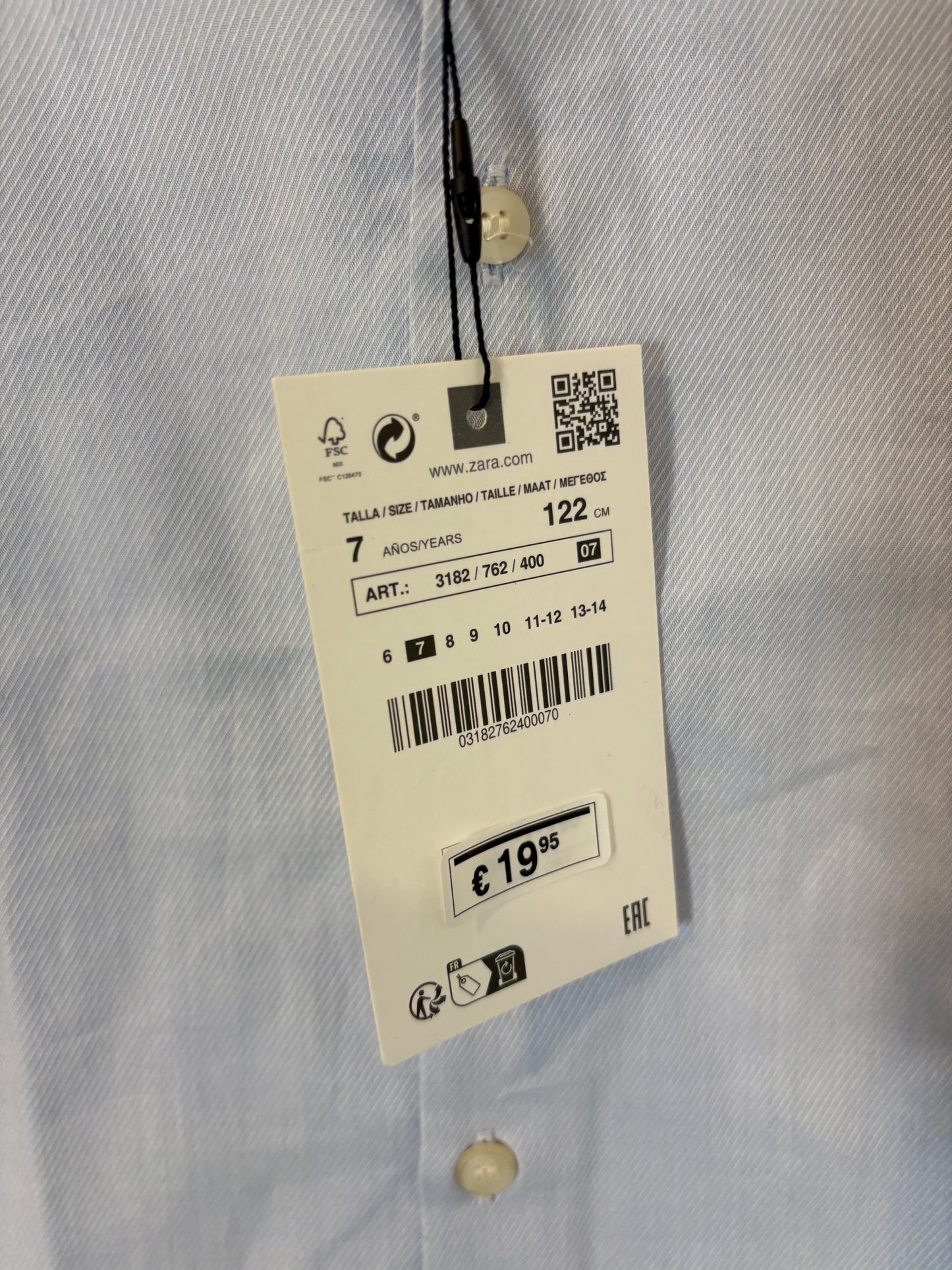 ZARA. Camisa clásica azul claro. T 7 años