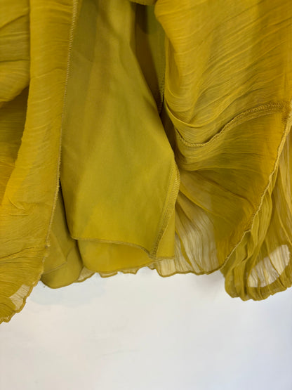 CORTEFIEL. Blusa pistacho plisada