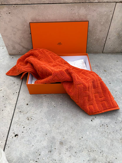 HERMES. Toalla de invitados en naranja