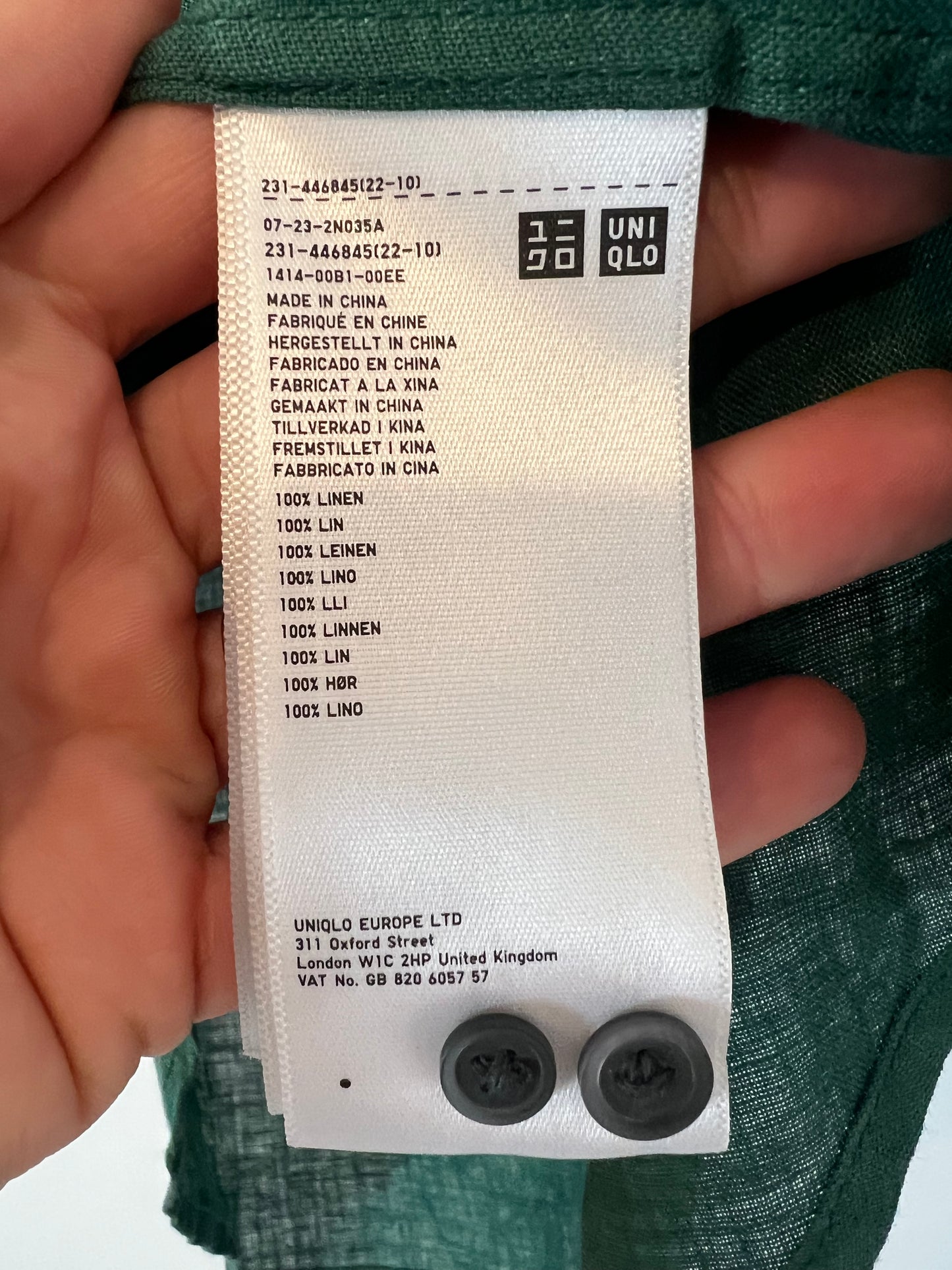 UNIQLO. Dark green linen blouse. Size XS