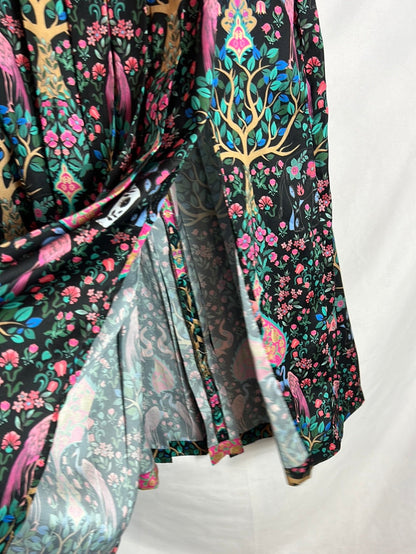 SANDRO. Total look blusa y falda midi estampada. T 1(S)