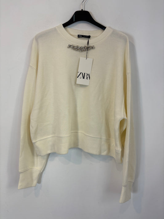 ZARA. Jersey color crudo detalle escote. T S