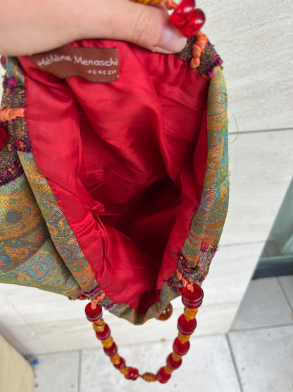 HELENE MENASCHE. Bolso estampado detalle asa