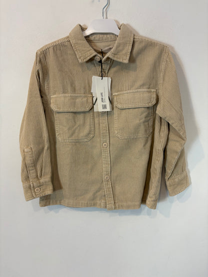 ZARA. Sobre camisa beige pana. T 7 años