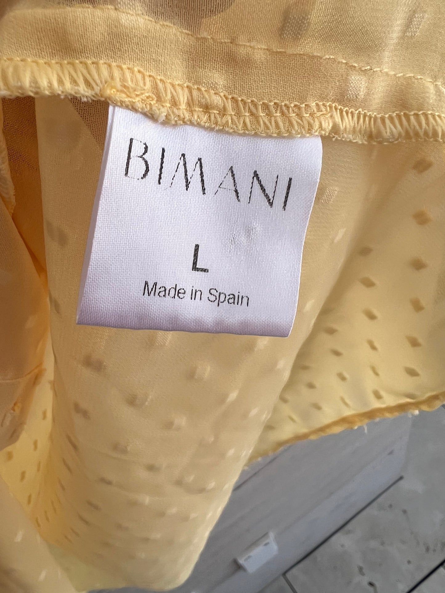BIMANI. Blusa amarilla plumeti T.L