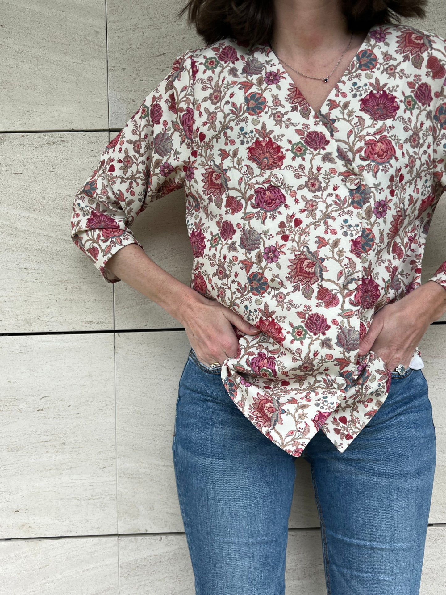 KOTIDIAN. Beige floral crossed Ts blouse