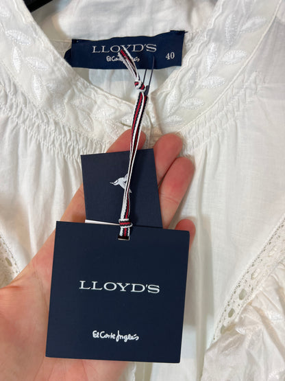 LLOYD'S. White ruffled blouse, size 40