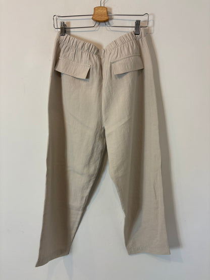 ZARA. Pantalón fluido beige. T M