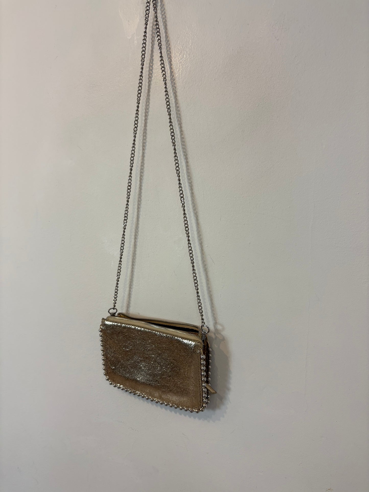 ZARA. Bolso dorados tachuelas