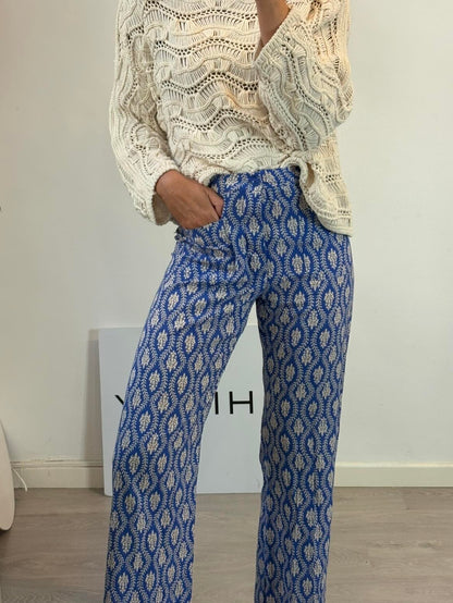 ZARA. Pantalón azul fluido abotonado