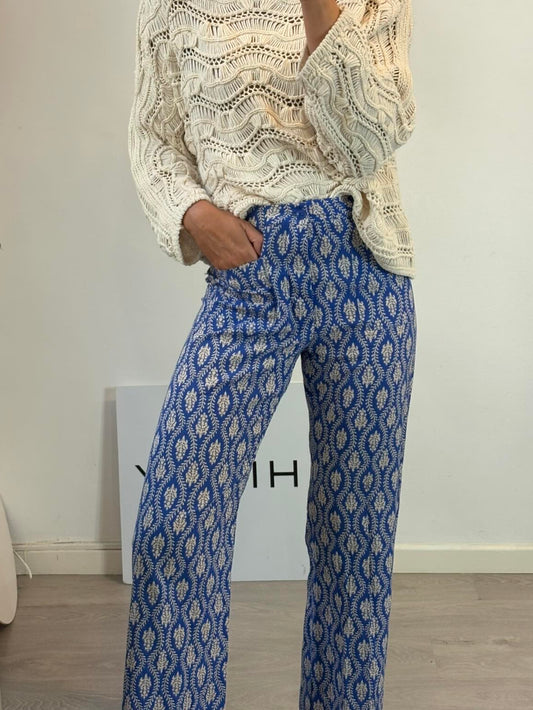ZARA. Pantalón azul fluido abotonado