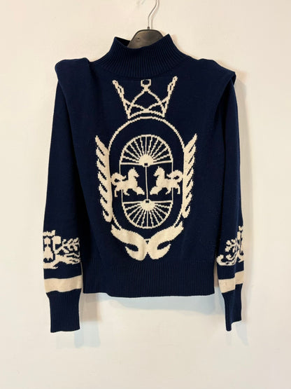 IQ. Jersey azul dibujo con lana