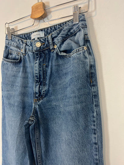 SCALPERS. Denim tiro alto campana. T 36