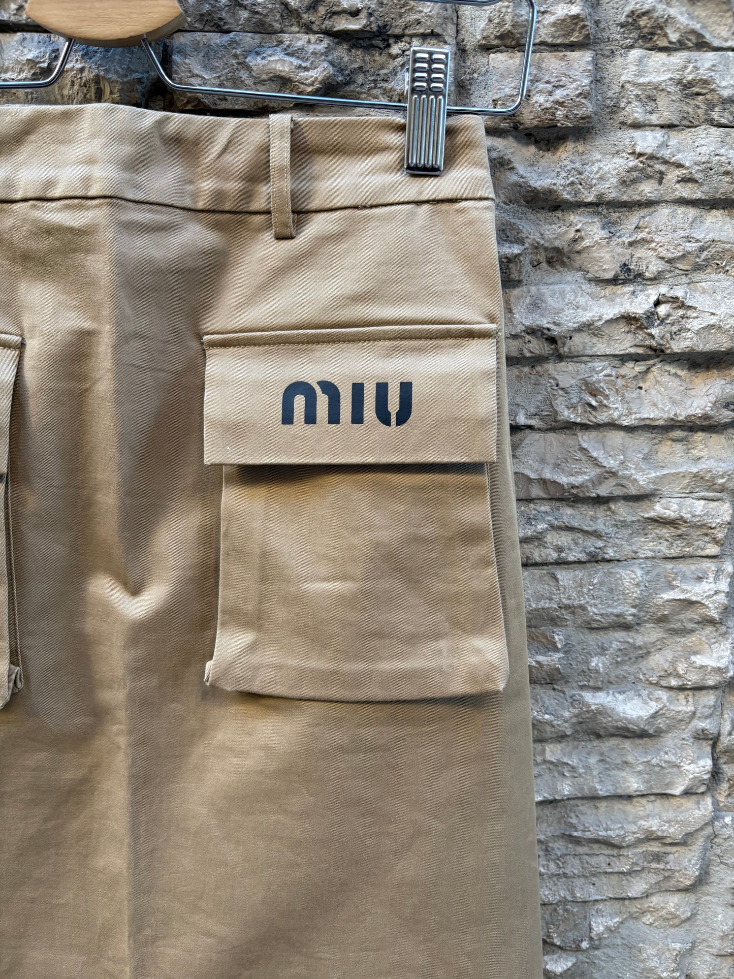 MIU MIU. Falda midi bolsillos T.m