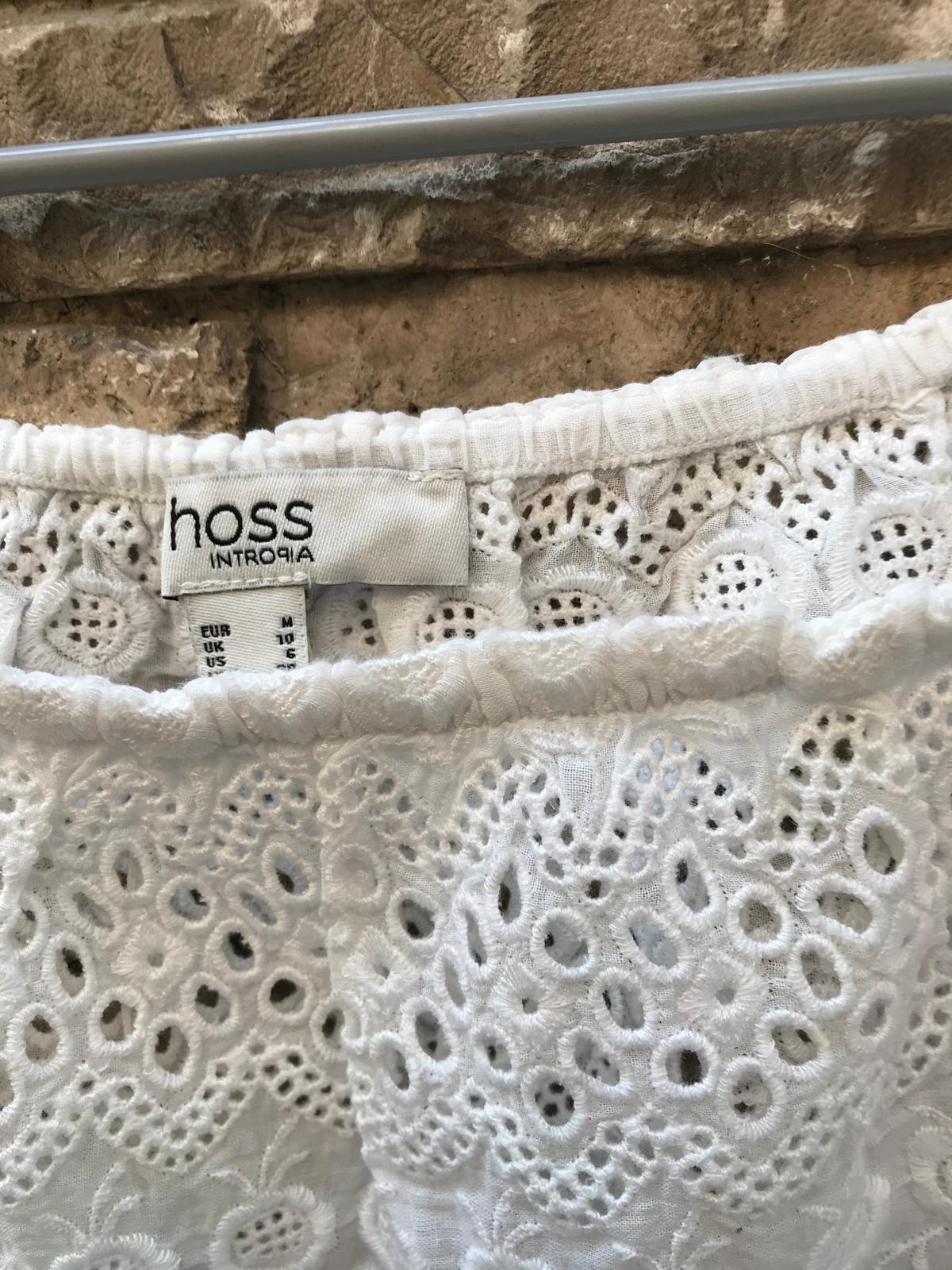 INTROPIA. Blusa blanca detalles bordados