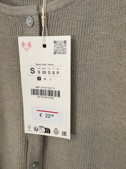 ZARA. Top punto abotonado