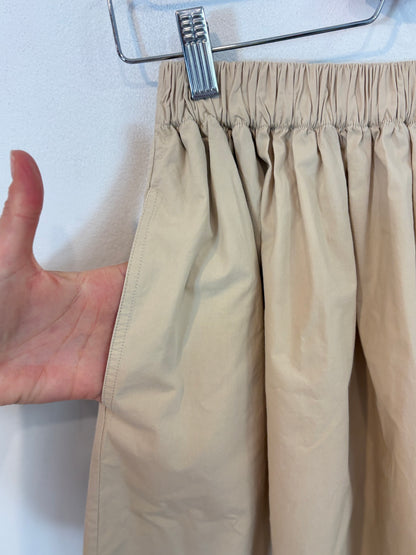 MASSIMO DUTTI. Falda larga beige bolsillos