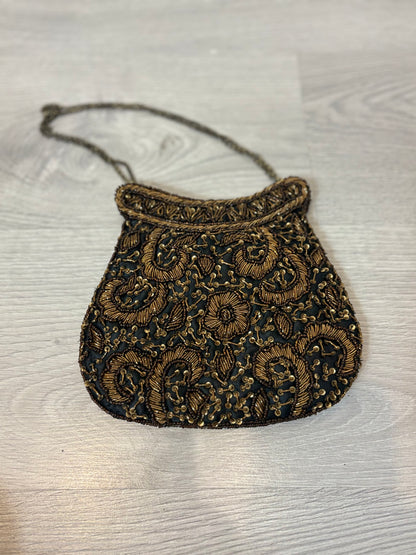 OTRAS. Bolso de mano pedrería