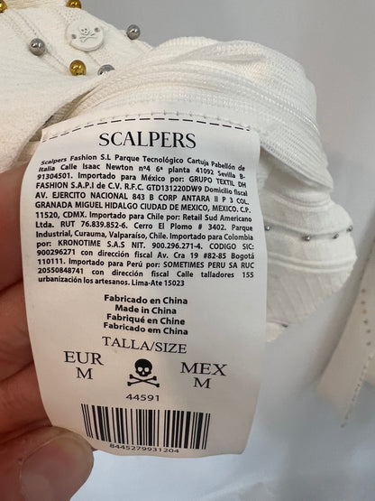 SCALPERS. Total look blanco con tachuelas T.m