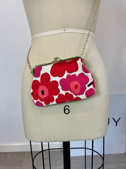 OTRAS. Bolso mini flores rosas