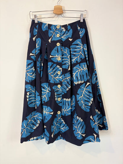 TOAST . Falda midi estampada bolsillos