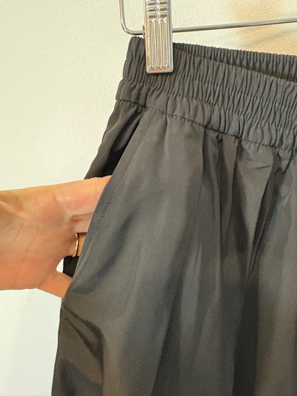 ZARA. Falda larga negra bolsillos