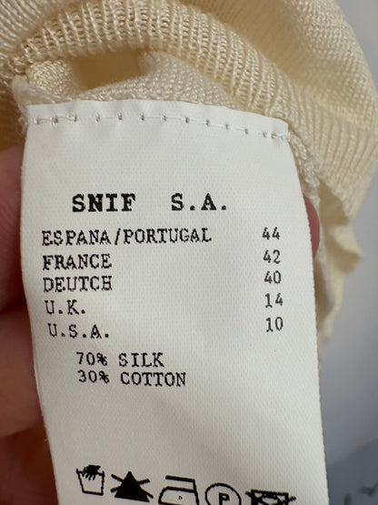 ROBERTO TORRERTA. Chaqueta seda lazada
