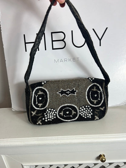 RESTMONT. Bolso asa corta pedreria