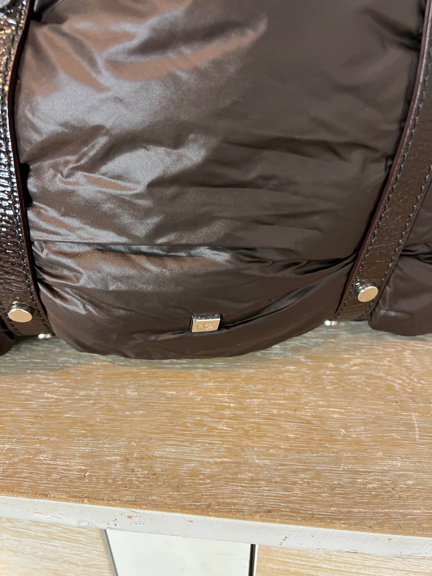 PURIFICACIÓN GARCIA. Medium brown quilted handbag