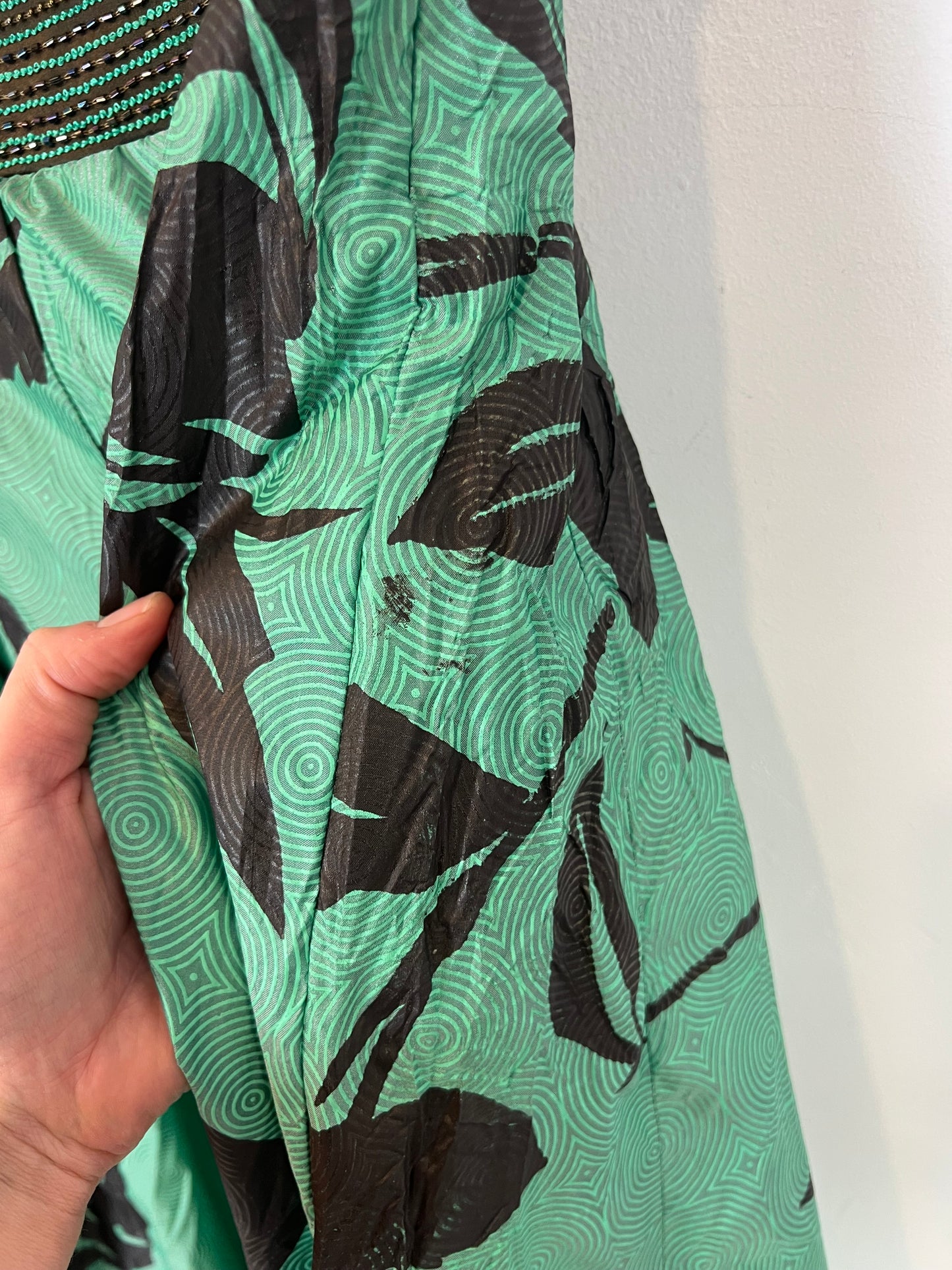 KAVITA BHARTIA. Falda larga detalle abalorios . T M