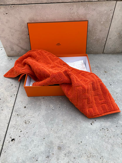 HERMES. Toalla de invitados en naranja