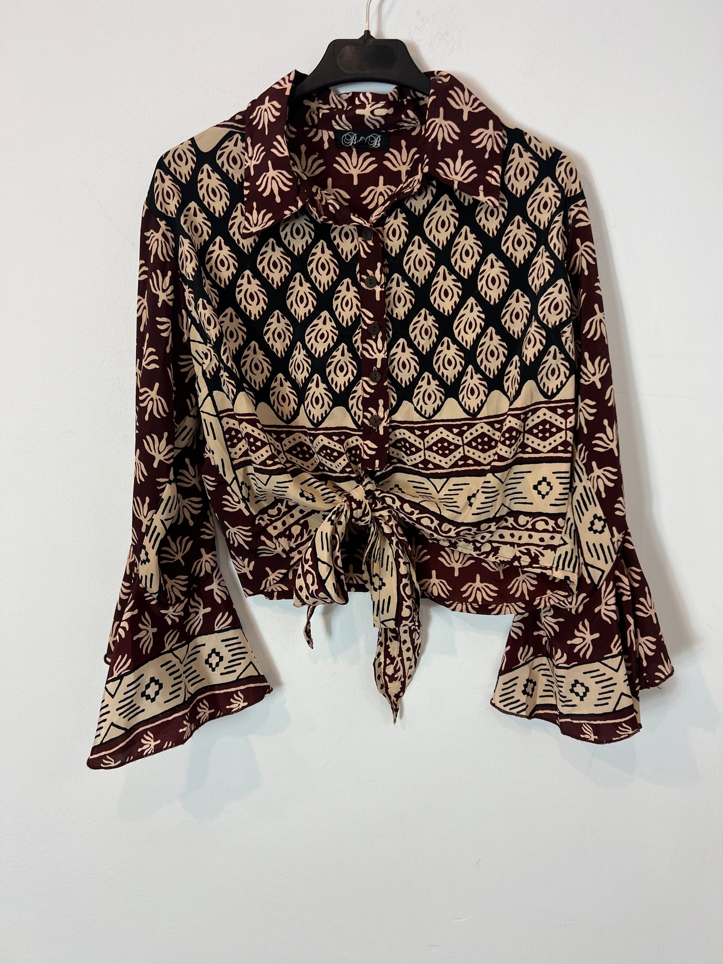 OTHERS. Total look: flowing trousers and YOUR top